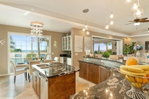 Blown glass bubble lamps and skylights brighten the spacious kitchen.