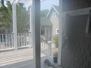 Main House Porch View To Crofter Through Courtyard.  Loveseat on Porch (not pic)