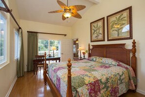 The master bedroom has a 4-poster, King-sized bed, A/C and en suite bathroom.