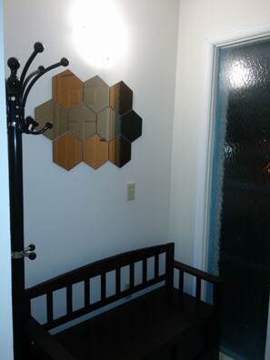 Entry hall with a bench and rack