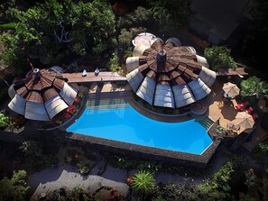 Aerial view: main house (R) and master suite (L) connected by covered breezeway