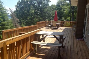 The deck offers plenty of sitting and gathering space.