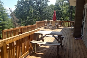 The deck offers plenty of sitting and gathering space.
