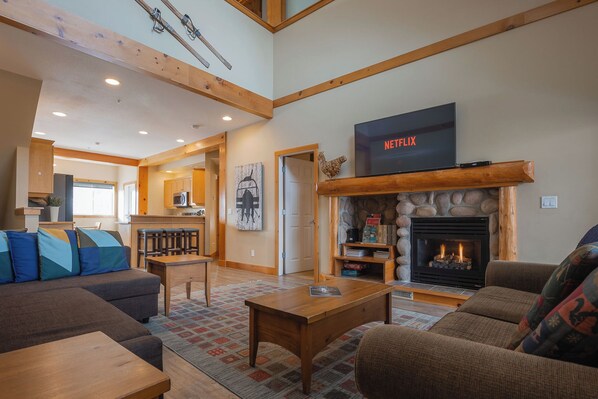 The hangout room, very cozy with games, gas fireplace and hot tub steps away! 