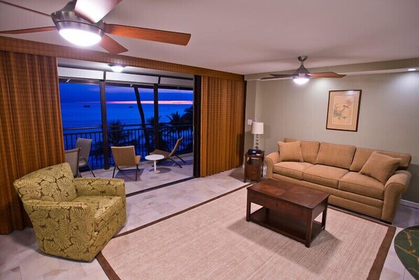 Remodeled living area with dual ceiling fans and central A/C upon request