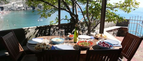 The terrace - covered lunch area with beautiful seaview