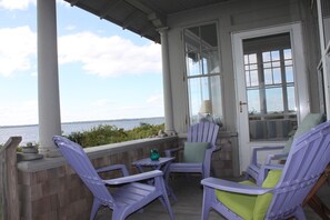 Front porch where you sit and watch the sunset every night.