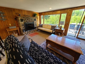 Comfortable and clean living room set up for relaxation and river views!