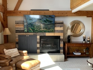 The Great Room has 20ft ceiling and a Media Center With Fire Place