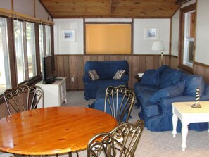 Comfortable, relaxing porch overlooking the Lake.  Play games at the table.