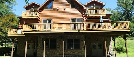 Back of house; Long deck; 3 bedrooms have balconies