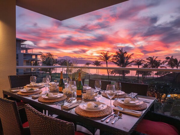 Experience unforgettable oceanfront dining with breathtaking sunset views. This private lanai offers the perfect setting for an elegant evening in paradise.