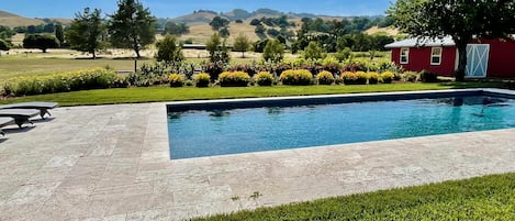 The  hill views from the expansive 20'x40' pool deck takes all your stress away