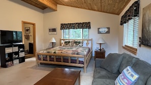 A comfortable and spacious King size bed with an ensuite bath and sitting area