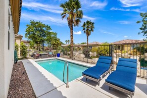 Private, heated pool with brand new lounge chairs.