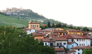 View of TorreBarolo with La Morra in the distance on the hilltop. 