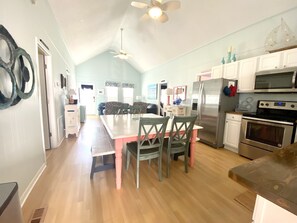Oversized table to sit everyone and still have room for an ongoing puzzle