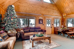 The cabin is spacious and has lots of windows to frame the gorgeous views of the white-capped mountains.