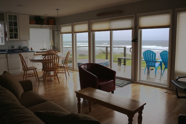 Oceanfront deck with HOT TUB in background, Dory Cove suite. Kitchen on left.