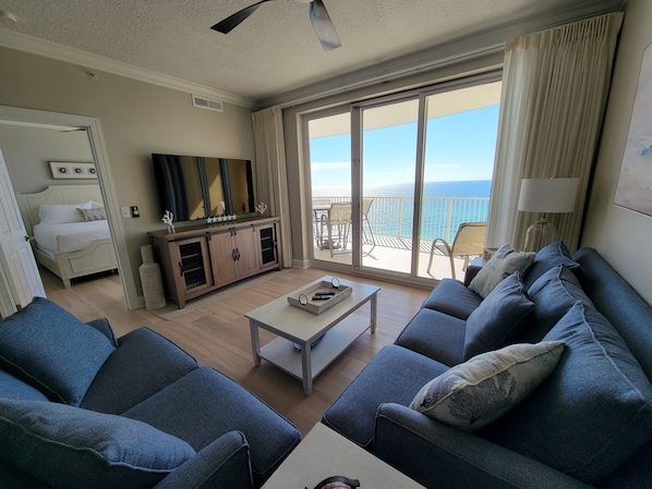 Living Room with Love Seat and Couch That Opens Into Pull Out Bed 