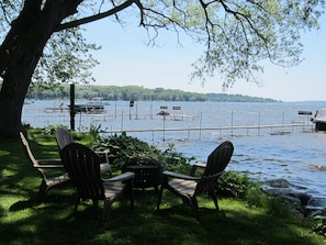 View of Lake, Dock, and Fire Pit from Yard