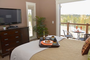 Master bedroom, 42" plasma TV, private deck overlooking the Purcell Mountains