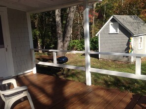 Covered Deck Overlooking Back Yard