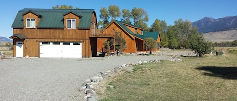 The  cabin is in front over the garage, still very private from the house. 