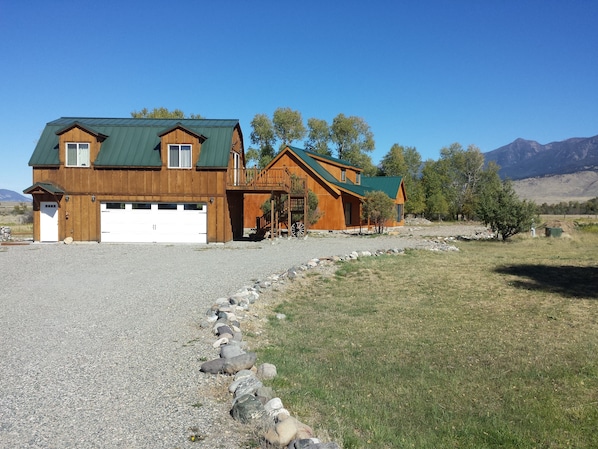 The  cabin is in front over the garage, still very private from the house. 