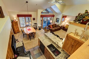 Open floor plan with vaulted ceilings