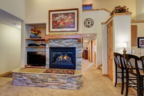 Fireplace and 40 inch flatscreen TV in living area