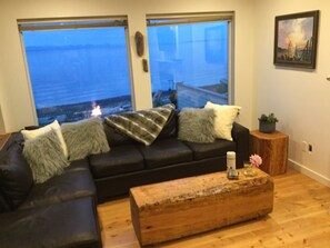 Living room overlooking Storys Beach 
