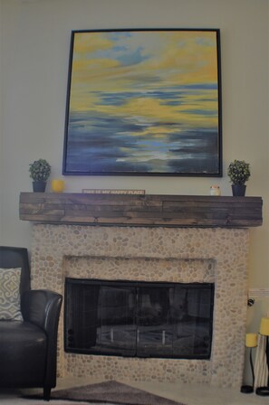 Gas Fireplace with reclaimed wood mantle