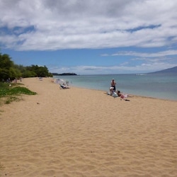 Quiet beach looking towards Black Rock. Snorkeling right here!