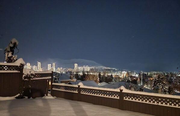 View of Coquitlam high-rises from your private, covered back patio.