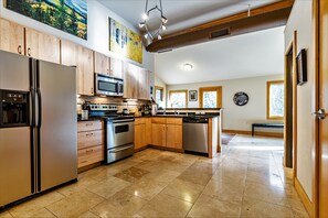 Fully stocked kitchen so cooking is a breeze.  Lovely hickory cabinets.