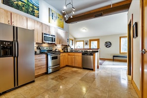 Fully stocked kitchen so cooking is a breeze.  Lovely hickory cabinets.