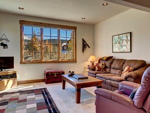 Living Room with TV, Stereo, Lazy Boy, Sleeper Sofa, and View of Bald Mt. 