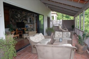 Spacious Sunken Great Room Opening Onto Verandah Thru Large Glass Sliders Doors.