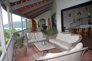 Verandah Looking Into Formal Dining Room And Overlooking Coral Bay To The South.