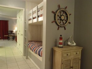 Kids of all ages love the bunks! Pocket door provides privacy to living area