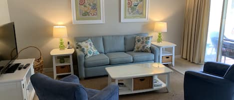 The Family Room is bright and comfortable with a new couch in 2019!