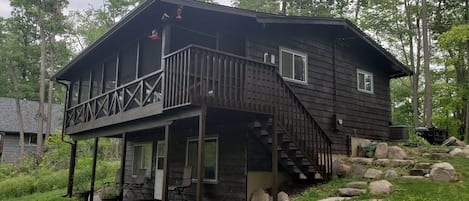 The screen porch over looks the lake.