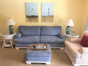 Comfortable furniture in tastefully decorated living room