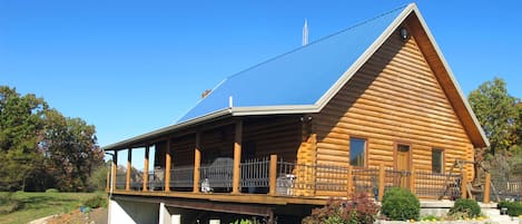 View of front and covered deck