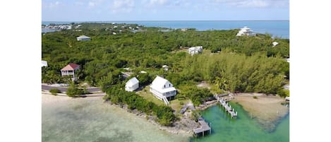 Coco Point Cottage, main house and guest house with deep water dock 