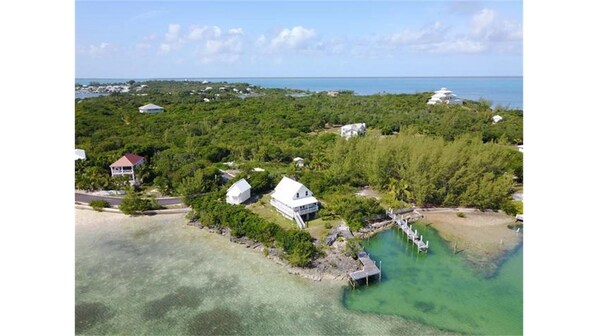 Coco Point Cottage, main house and guest house with deep water dock 