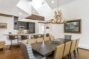 Dining table for 10, humanely sourced antler chandelier!