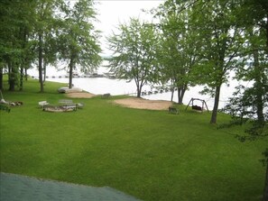 Beachfront, dock and firepit are all in the common area next to the cottage.