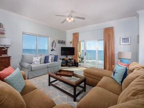 Living Room with large TV/DVD and balcony 